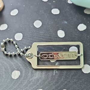 Coach Metallic Silver Bag Tag